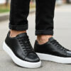 Basket en cuir noir avec semelle blanc réf 232